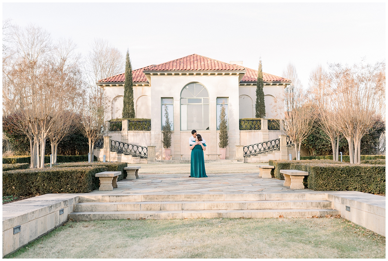 Guy holding girl from behind at Tulsa Philbrook Museum Engagement Session