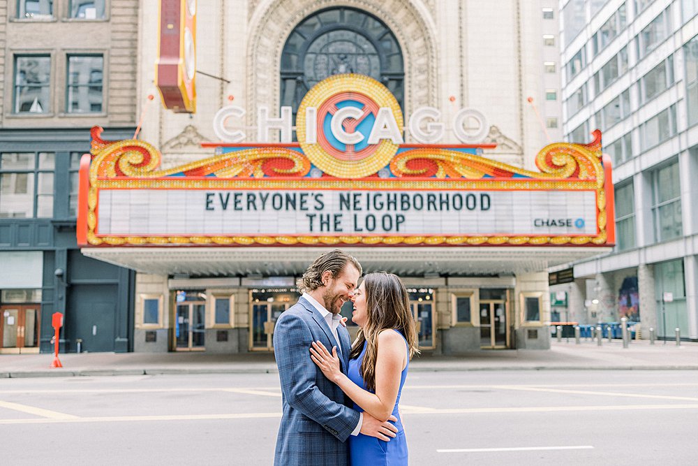 Couple embracing in Chicago engagement session - Chicago Neighborhood Loop